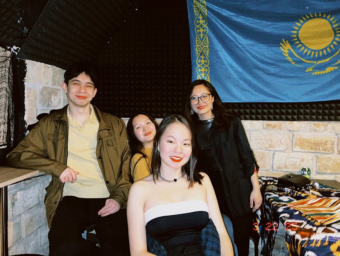 Budapest Tunderi guests near the Kazakhstan flag